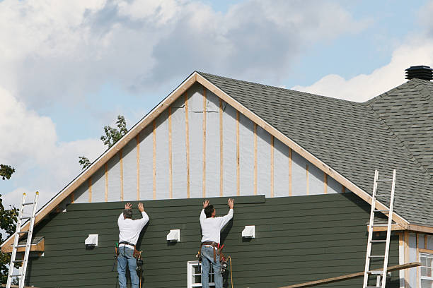 Professional Siding technician working in Clarksville, IN